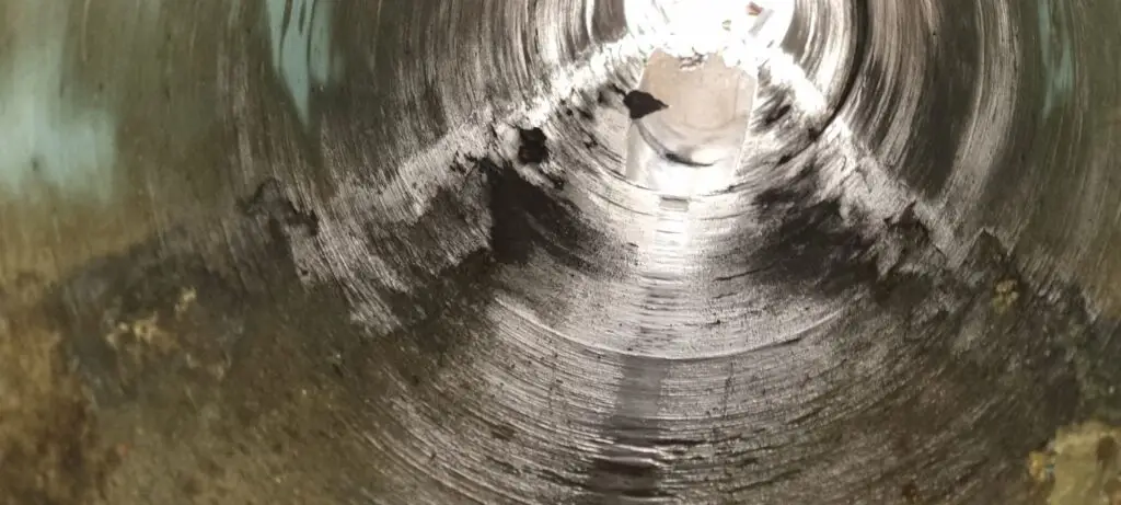 Inside view of a corroded metal pipe